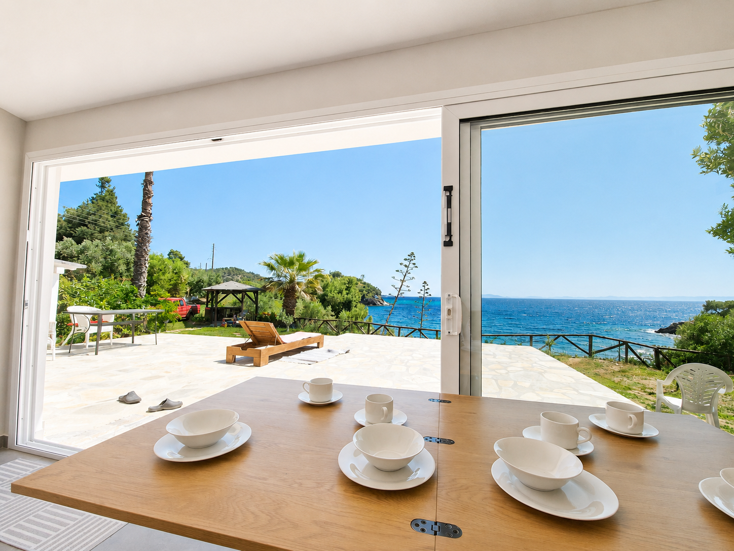 Open terrace overlooking the Aegean Sea at Kalogria Beach