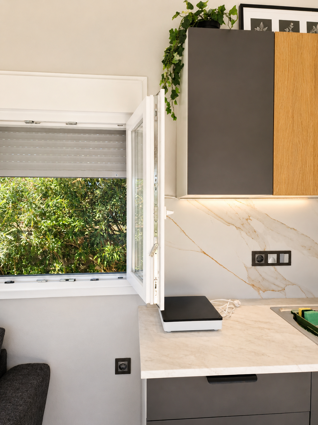 Compact kitchenette with stone countertop